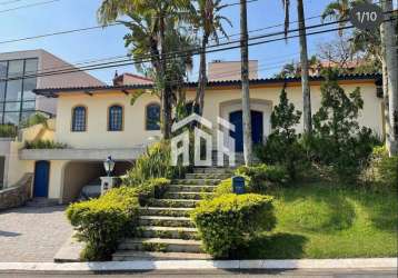 Casa térrea com piscina e amplo jardim em alphaville residencial 03