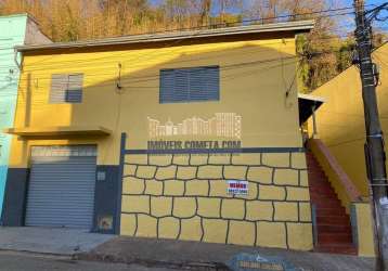 Casa com edicula em centro, águas da prata/sp