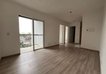 Apartamento  central com sacada e churrasqueira