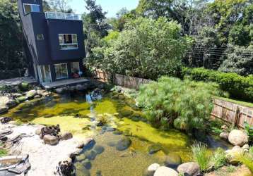 Encantadora casa triplex com lago artificial à venda em nova guarapari - um paraíso particular a po