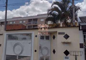 Casa com 3 dormitórios à venda, 100 m²