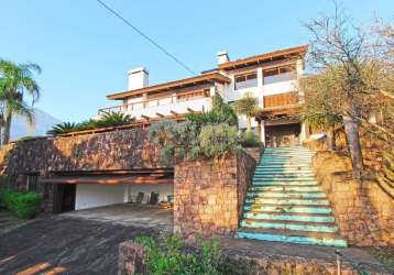 Casa com 4 quartos à venda na rua dona lida monteiro, 180, teresópolis, porto alegre por r$ 1.300.000