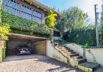 Casa com 3 quartos à venda na rua professor emílio meyer, 349, vila conceição, porto alegre por r$ 1.499.000