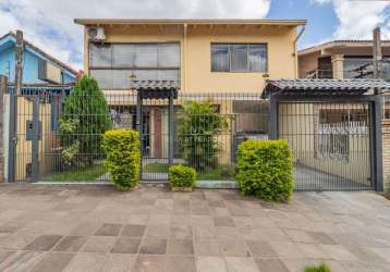 Casa com 3 quartos à venda na estrada vila maria, 75, cavalhada, porto alegre por r$ 860.000