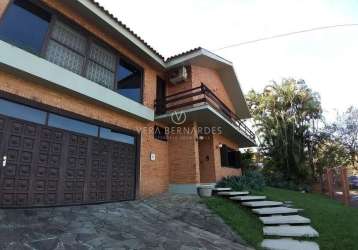 Casa com 4 quartos à venda na rua manauê, 60, vila assunção, porto alegre por r$ 1.300.000