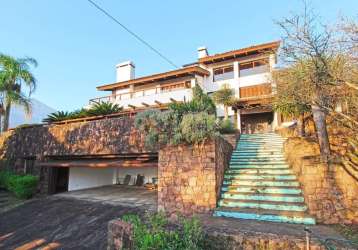 Casa com 4 quartos à venda na rua dona lida monteiro, 180, teresópolis, porto alegre por r$ 1.890.000