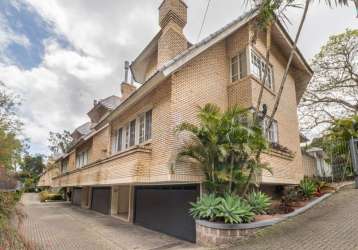 Casa em condomínio fechado com 3 quartos à venda na rua doutor arnaldo da silva ferreira, 450, jardim isabel, porto alegre por r$ 1.250.000