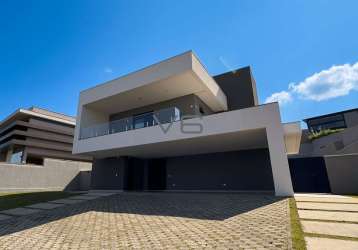 Casa alto padrão, 4 quartos sendo 3 suítes, 370 m² privativos, 6 vagas de garagem, no alphaville, pinhais - pr.