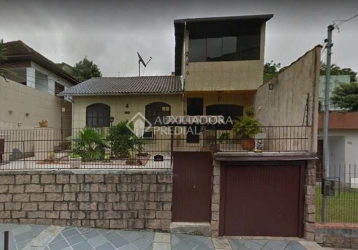 Casa para Venda - Porto Alegre / RS no bairro Teresópolis, 3 dormitórios, 2  banheiros, 3 vagas de garagem, área total 396,00 m², área útil 250,00 m²