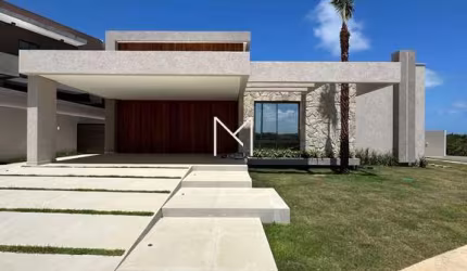 CASA EM CONDOMÍNIO FECHADO COM 4/4