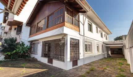 Casa com 6 quartos à venda na Travessa Olintho Sanmartin, 42, Vila Ipiranga, Porto Alegre por R$ 1.150.000