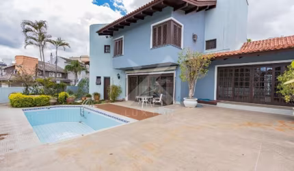 Casa com 4 quartos à venda na Rua Miracema, 15, Chácara das Pedras, Porto Alegre por R$ 1.650.000