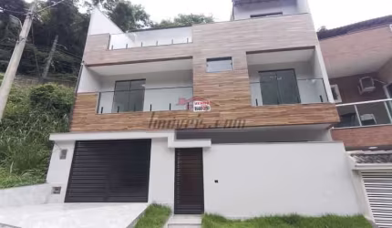 Casa em condomínio fechado com 3 quartos à venda na Estrada Curumau, 1333, Taquara, Rio de Janeiro, 130 m2 por R$ 450.000
