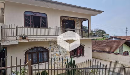 Sobrado com 3 dormitórios à venda, 392 m² por R$ 1.020.000,00 - Iririú - Joinville/SC