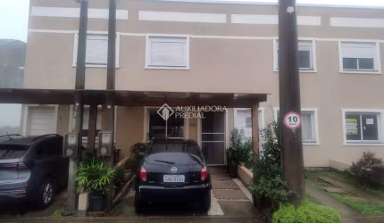 Casa em condomínio fechado com 2 quartos à venda na Rua Capitão Pedroso, 416, Restinga, Porto Alegre, 82 m2 por R$ 250.000