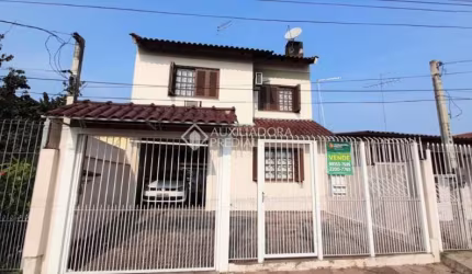 Casa com 3 quartos à venda na Rua Integração, 348, Jardim Algarve, Alvorada, 250 m2 por R$ 430.000