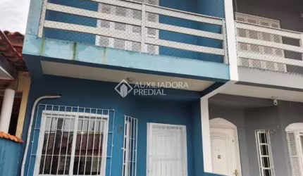 Casa com 2 quartos à venda na Rua Flamingos, 121, Jardim Algarve, Alvorada, 74 m2 por R$ 249.900