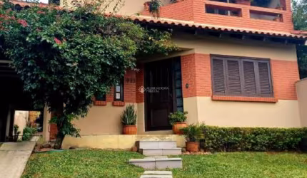 Casa com 3 quartos à venda na Avenida Elmira Pereira Silveira, 1033, Jardim Algarve, Alvorada, 230 m2 por R$ 890.000
