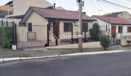 Casa com 2 quartos à venda na Rua Canários, 1232, Jardim Algarve, Alvorada, 68 m2 por R$ 339.900