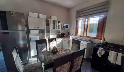 Casa com 3 quartos à venda na Rua Carlos Gomes, 137, Parque Tamandaré, Esteio, 169 m2 por R$ 478.000