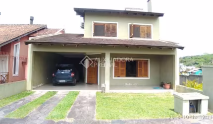 Casa em condomínio fechado com 3 quartos à venda na Rua Erny Ludwig, 135, Mário Quintana, Porto Alegre, 270 m2 por R$ 897.000