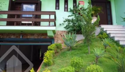 Casa em condomínio fechado com 4 quartos à venda na Rua Hipólito da Costa, 63, Santa Tereza, Porto Alegre, 330 m2 por R$ 856.000