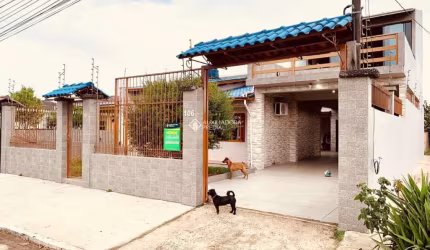 Casa com 2 quartos à venda na Rua Apolinária de Souza, 106, Harmonia, Canoas, 240 m2 por R$ 450.000