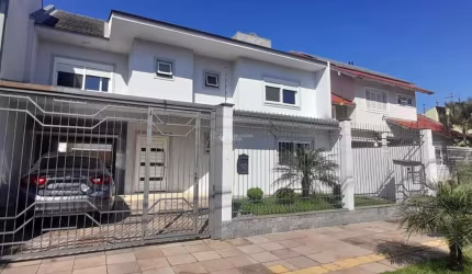 Casa com 4 quartos à venda na Rua Gardênia, 89, Estância Velha, Canoas, 250 m2 por R$ 1.600.000