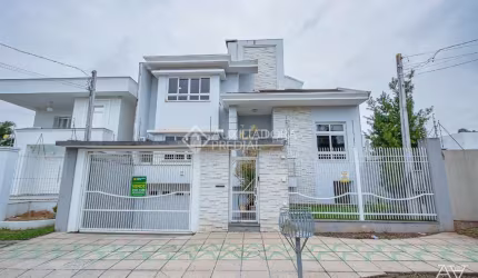 Casa com 5 quartos à venda na Rua País de Gales, 137, Marechal Rondon, Canoas, 359 m2 por R$ 1.599.000