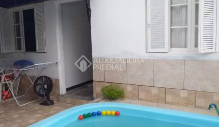 Casa em condomínio fechado com 5 quartos à venda na Rua Antônio Álvares Pereira Coruja, 123, Jardim Itu Sabará, Porto Alegre, 210 m2 por R$ 585.000