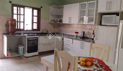 Casa com 3 quartos à venda na Rua Anhumas, 112, Jardim Algarve, Alvorada, 110 m2 por R$ 250.000