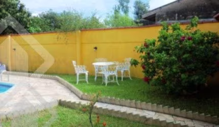 Casa em condomínio fechado com 3 quartos à venda na Rua Doutor Carlos Flores, 198, Belém Novo, Porto Alegre, 150 m2 por R$ 650.000