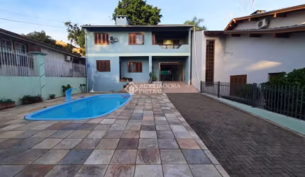 Casa com 4 quartos à venda na Rua Canela, 110, Ouro Branco, Novo Hamburgo, 242 m2 por R$ 742.000