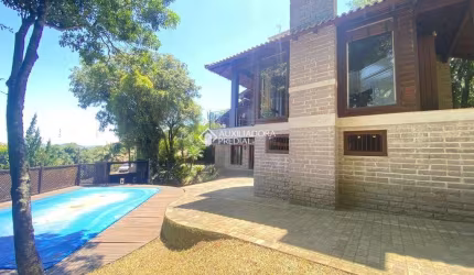 Casa em condomínio fechado com 3 quartos à venda na ALOYSIO MALDANER, 1270, Centro, Dois Irmãos, 380 m2 por R$ 1.196.000