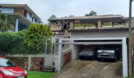 Casa em condomínio fechado com 3 quartos à venda na Rua Pinheiros, 120, São Lucas, Viamão, 223 m2 por R$ 570.000