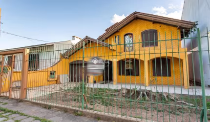 Casa com 4 quartos à venda na Rua Alfredo Silveira Dias, 169, Nonoai, Porto Alegre, 240 m2 por R$ 960.000