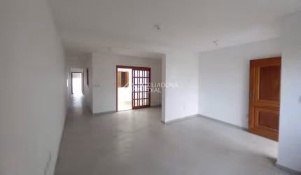 Casa em condomínio fechado com 2 quartos para alugar na Rua Jorge Babot Miranda, 413, Aberta dos Morros, Porto Alegre, 80 m2 por R$ 2.600