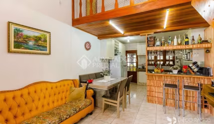 Casa em condomínio fechado com 2 quartos à venda na Rua Álamo-Branco, 45, Restinga, Porto Alegre, 136 m2 por R$ 330.000