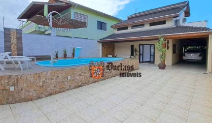 Sobrado com 4 dormitórios à venda, 246 m² por R$ 1.000.000,00 - Jardim Aruan - Caraguatatuba/SP