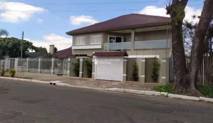 Casa com 3 quartos à venda na Rua das Araucárias, 262, Harmonia, Canoas, 370 m2 por R$ 1.200.000