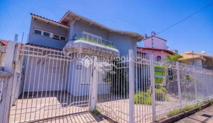 Casa com 3 quartos à venda na Avenida Doutor Sezefredo Azambuja Vieira, 156, Marechal Rondon, Canoas, 438 m2 por R$ 1.840.000