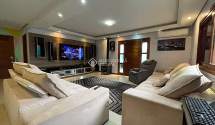 Casa com 3 quartos à venda na Rua Adão da Silva Santos, 1417, São José, Canoas, 120 m2 por R$ 800.000
