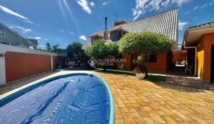 Casa com 5 quartos à venda na Rua Escócia, 29, Marechal Rondon, Canoas, 500 m2 por R$ 2.200.000