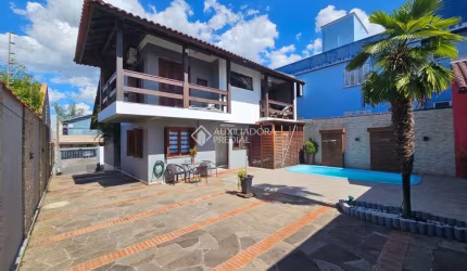 Casa com 4 quartos à venda na Rua Armando Dias Azevedo, 65, São José, Canoas, 219 m2 por R$ 1.030.000