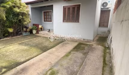 Casa com 3 quartos à venda na Rua Nebraska, 64, Mato Grande, Canoas, 70 m2 por R$ 410.000