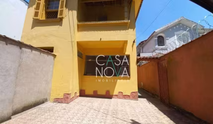 Sobrado com 3 dormitórios à venda, 218 m² por R$ 1.000.000,00 - Encruzilhada - Santos/SP