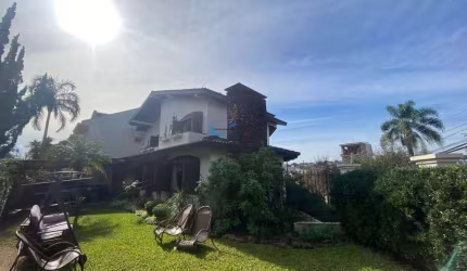 Casa em Porto Alegre, Três Figueiras, com 3 quartos, 322m²