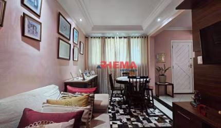 Sobrado com 3 dormitórios à venda, 100 m² por R$ 640.000,00 - Macuco - Santos/SP
