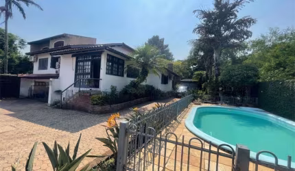 Casa em condomínio fechado com 4 quartos à venda na Rua Pedro A. A. de Freitas Filho, 186, Jardim Itu Sabará, Porto Alegre, 525 m2 por R$ 1.200.000