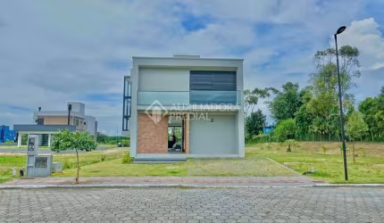 Casa em condomínio fechado com 4 quartos à venda na PORTO NOVO, 690, Praia do Rosa, Imbituba, 360 m2 por R$ 2.000.000